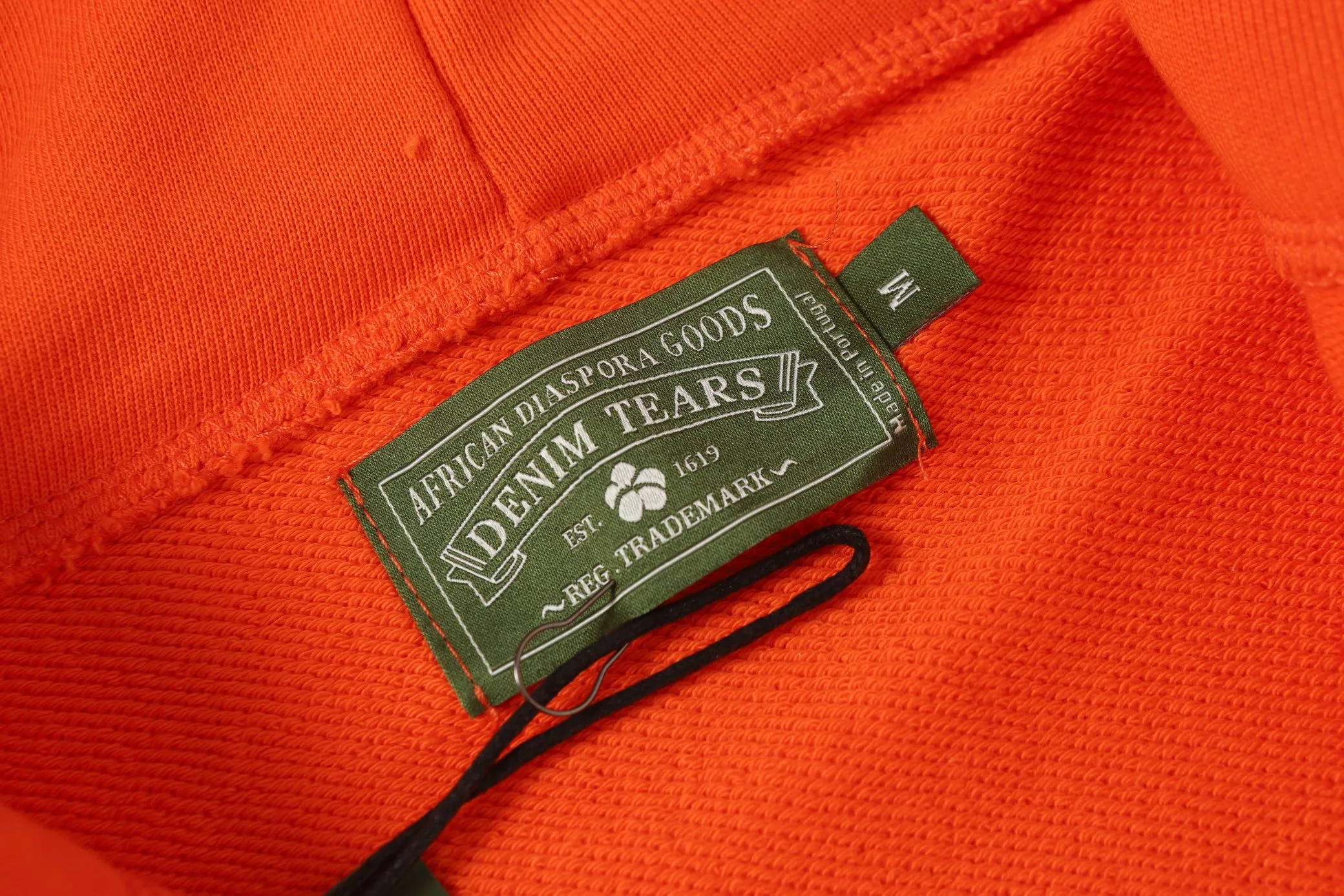 16 colors DENIM TEARS Kapok European and American trendy brand high-quality foam printed hooded sweatshirt jacket. Terry fabric weighs 380 grams. Threads are customized and dyed in the same color. Color Black Gray Blue Green Royal Blue Purple Red Orange Colorful Blue Pink White Sky Blue Brown Carbon Gray Black Gray White White Size S-XL